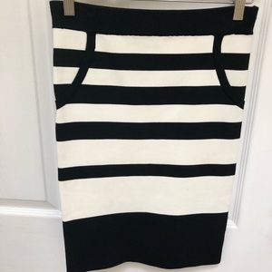 Black/White Bebe pencil skirt. Form fitting